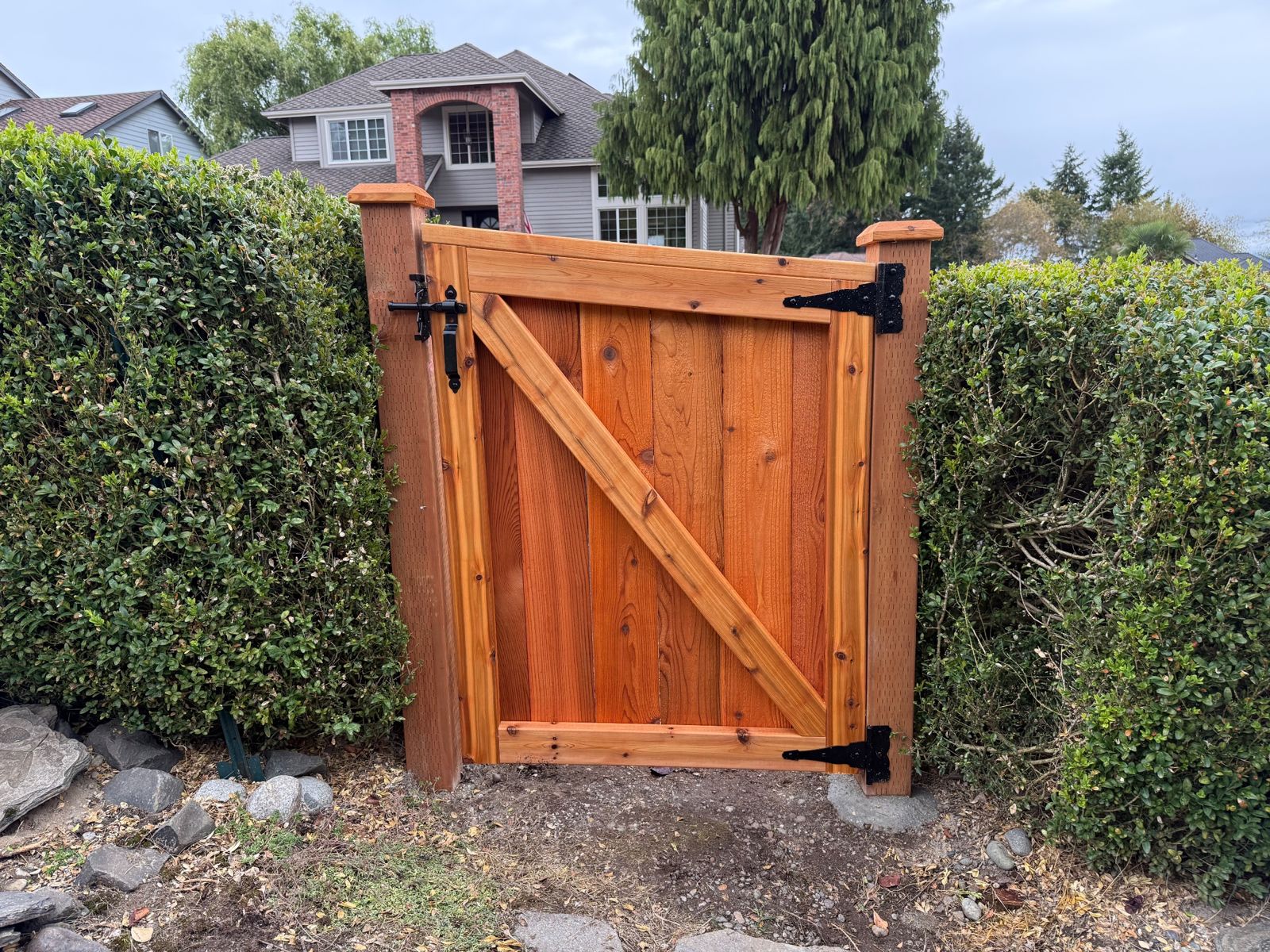 Modified cedar picture frame privacy fence with gate installed in Federal Way, WA, photo 10